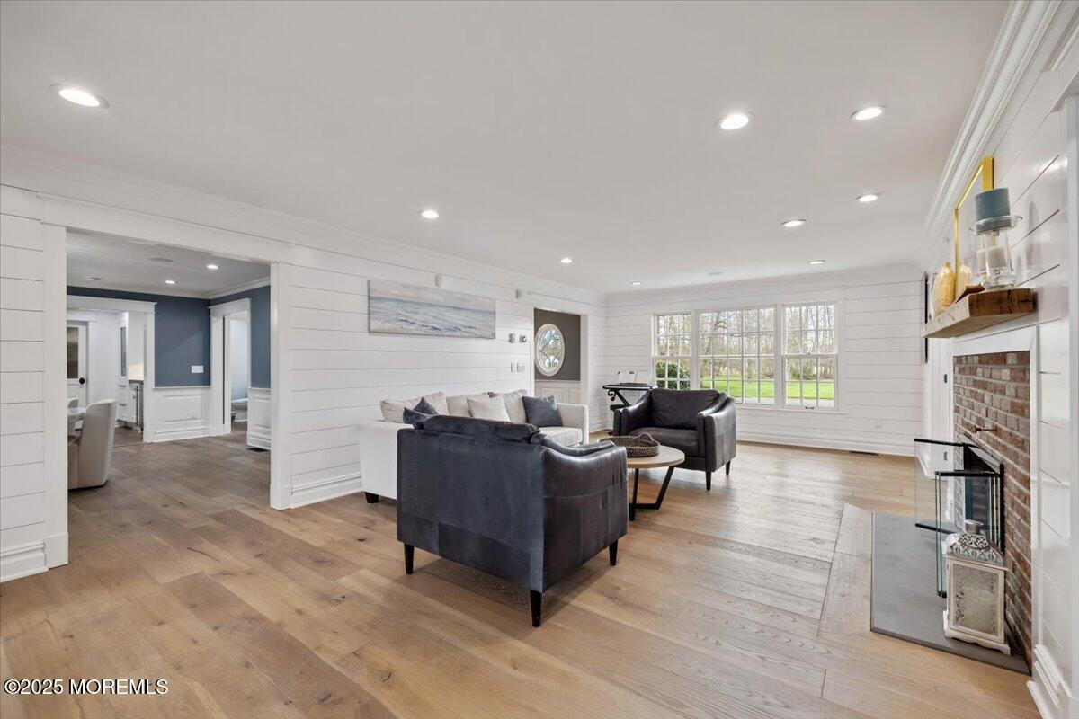4 Broadmoor Drive Rumson, NJ 07760 - Photo 14 of 52 a living room with furniture hard wood floor and a fireplace