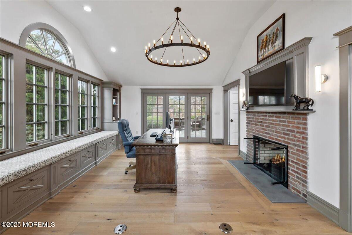 4 Broadmoor Drive Rumson, NJ 07760 - Photo 16 of 52 a large living room with fireplace furniture and a large window