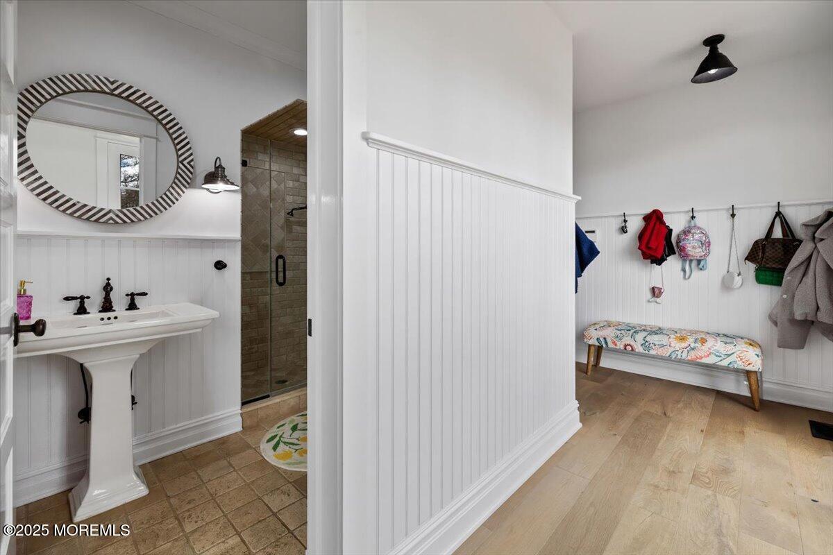 4 Broadmoor Drive Rumson, NJ 07760 - Photo 17 of 52 a bathroom with a sink mirror and toilet