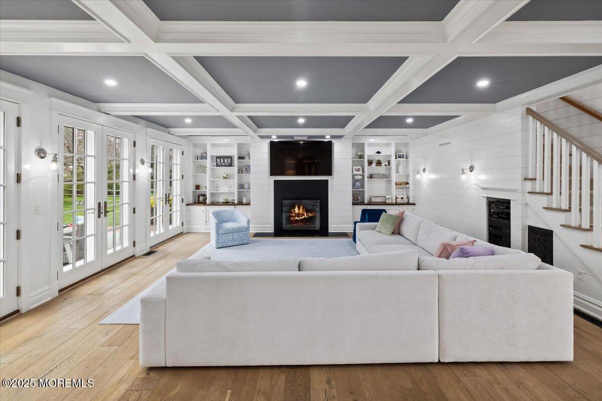 4 Broadmoor Drive Rumson, NJ 07760 - Photo 18 of 52 a living room with fireplace furniture and a flat screen tv