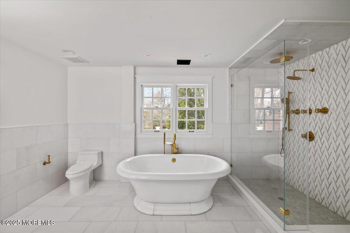 4 Broadmoor Drive Rumson, NJ 07760 - Photo 24 of 52 a bathroom with a sink toilet and shower