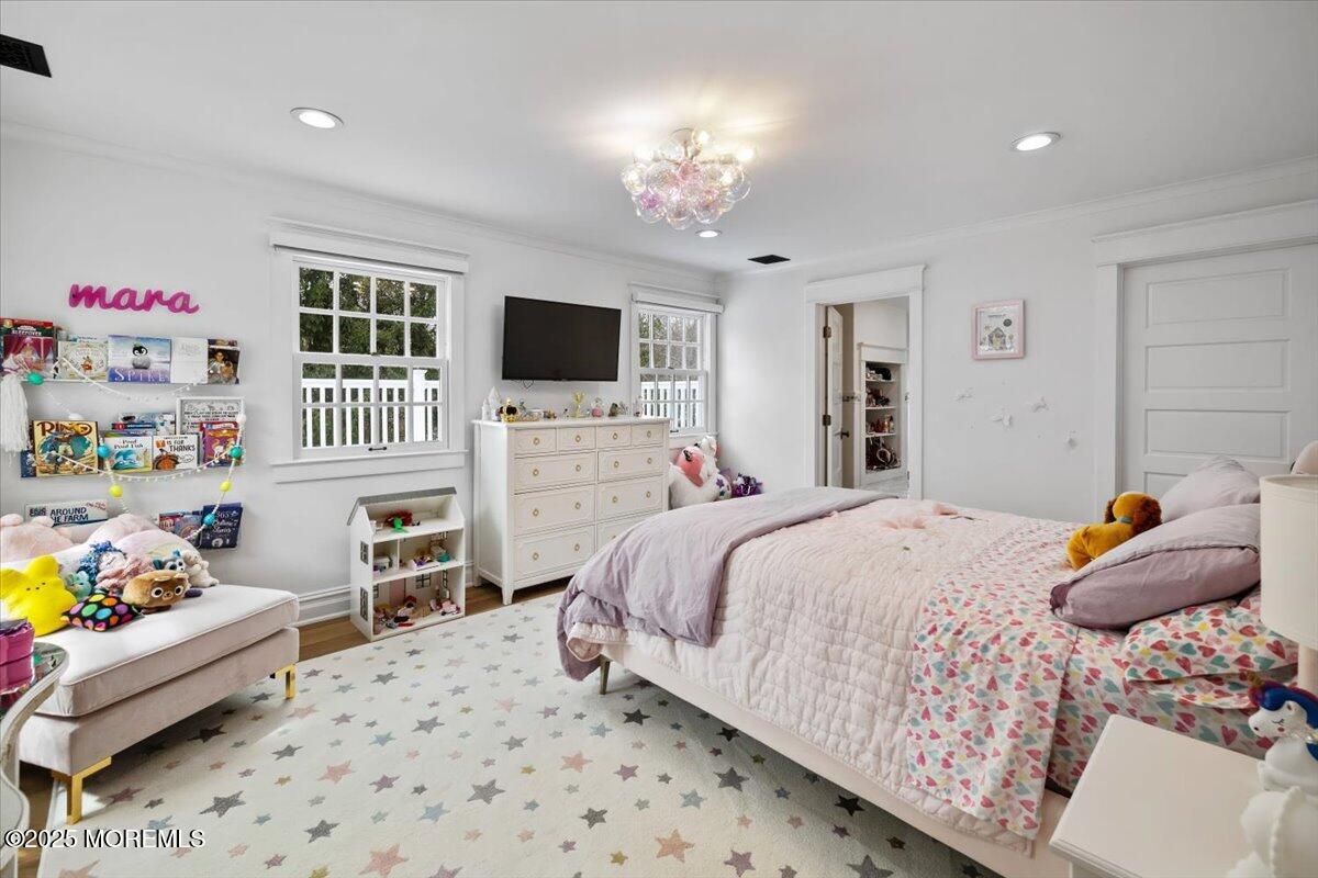 4 Broadmoor Drive Rumson, NJ 07760 - Photo 28 of 52 a bedroom with a bed and a flat screen tv