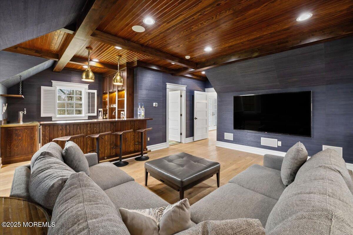 4 Broadmoor Drive Rumson, NJ 07760 - Photo 33 of 52 a living room with furniture and a flat screen tv