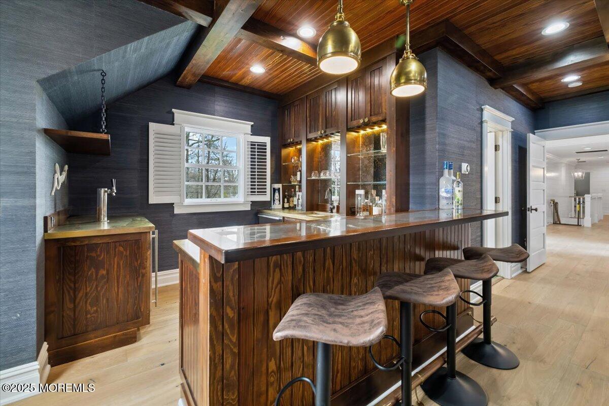 4 Broadmoor Drive Rumson, NJ 07760 - Photo 34 of 52 a kitchen with a table and chairs in it