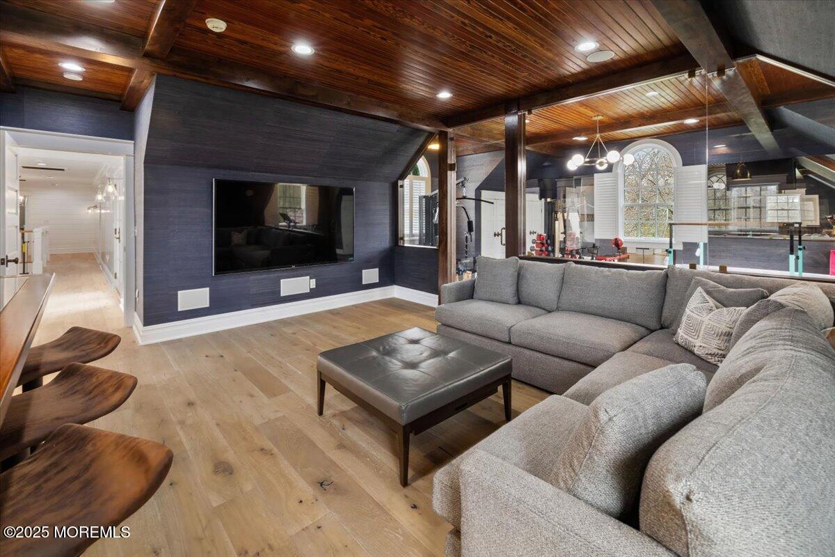 4 Broadmoor Drive Rumson, NJ 07760 - Photo 35 of 52 a living room with furniture and a flat screen tv