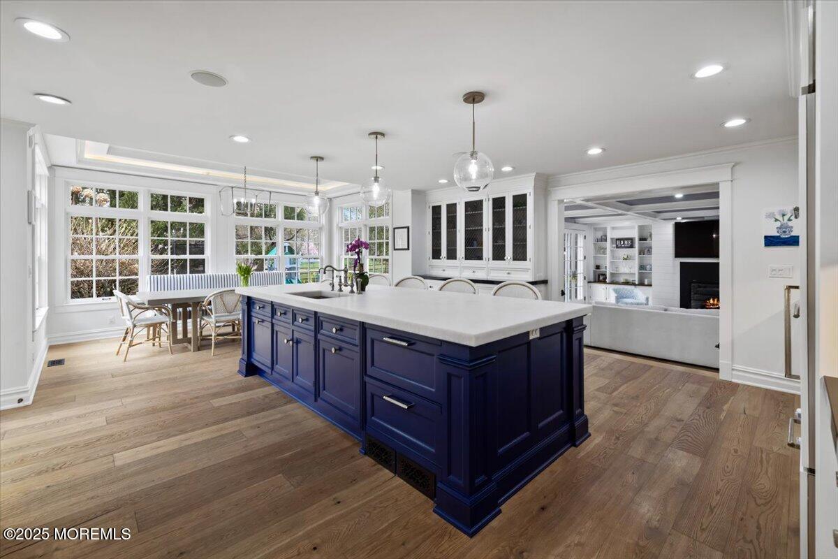 4 Broadmoor Drive Rumson, NJ 07760 - Photo 6 of 52 a large kitchen with a large counter top and stainless steel appliances