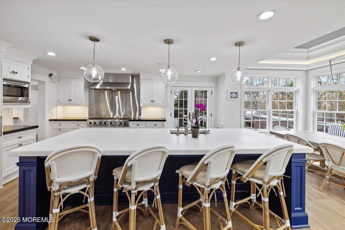 4 Broadmoor Drive Rumson, NJ 07760 - Photo 8 of 52 a dining room with furniture a window and kitchen view