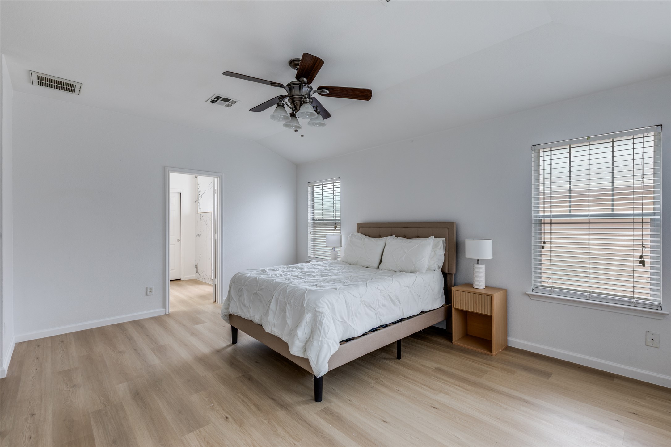814 Bogart Road Cedar Park, TX 78613 - Photo 14 of 25 a bedroom with a bed and window