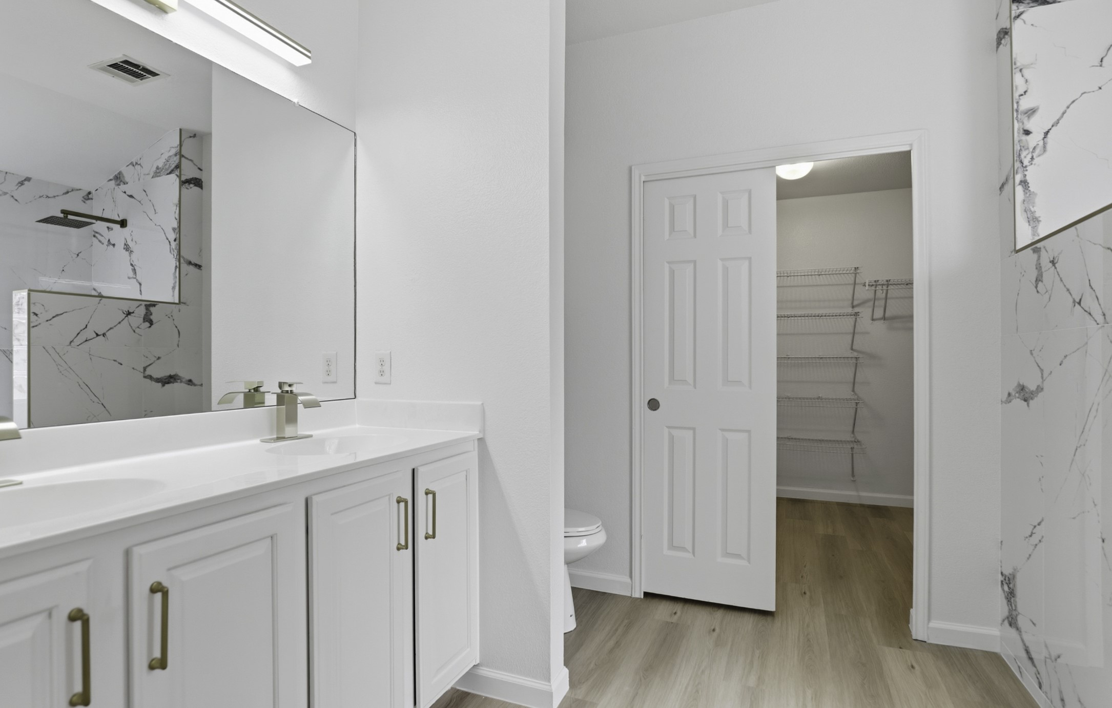 814 Bogart Road Cedar Park, TX 78613 - Photo 16 of 25 a bathroom with a sink and a mirror