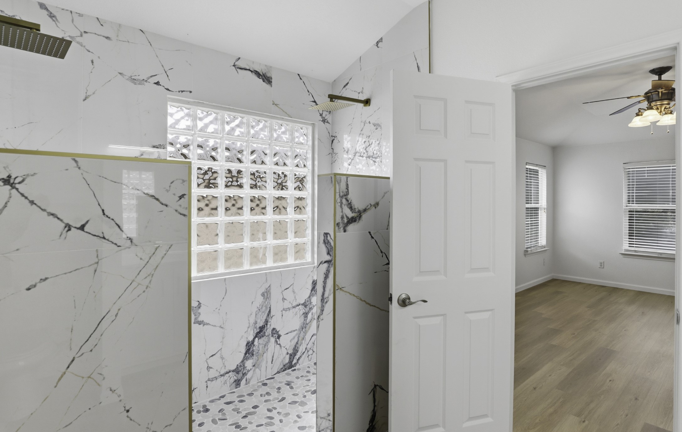 814 Bogart Road Cedar Park, TX 78613 - Photo 3 of 25 a view of a bathroom with a shower and a curtain