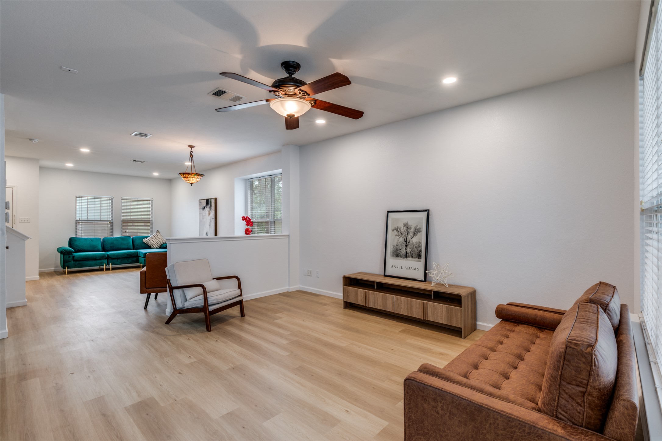 814 Bogart Road Cedar Park, TX 78613 - Photo 6 of 25 a living room with furniture and a flat screen tv