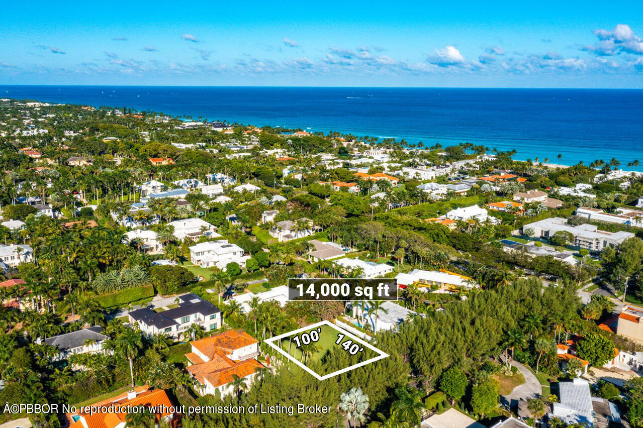225 Wells Road Palm Beach, FL 33480 - Photo 10 of 12 a view of a large building with an ocean