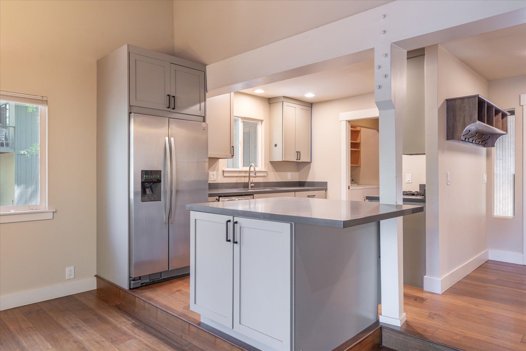 10644 Codogan Street Truckee, CA 96161 - Photo 13 of 28 a kitchen with stainless steel appliances granite countertop a refrigerator and a sink