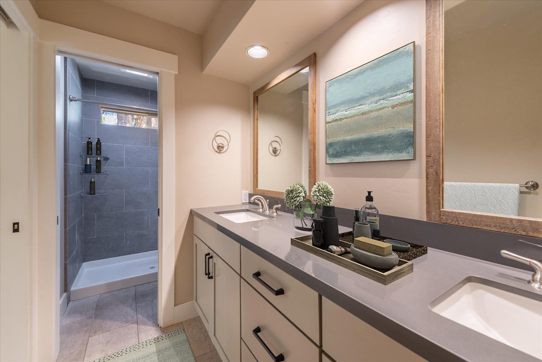 10644 Codogan Street Truckee, CA 96161 - Photo 9 of 28 a bathroom with a sink and a mirror