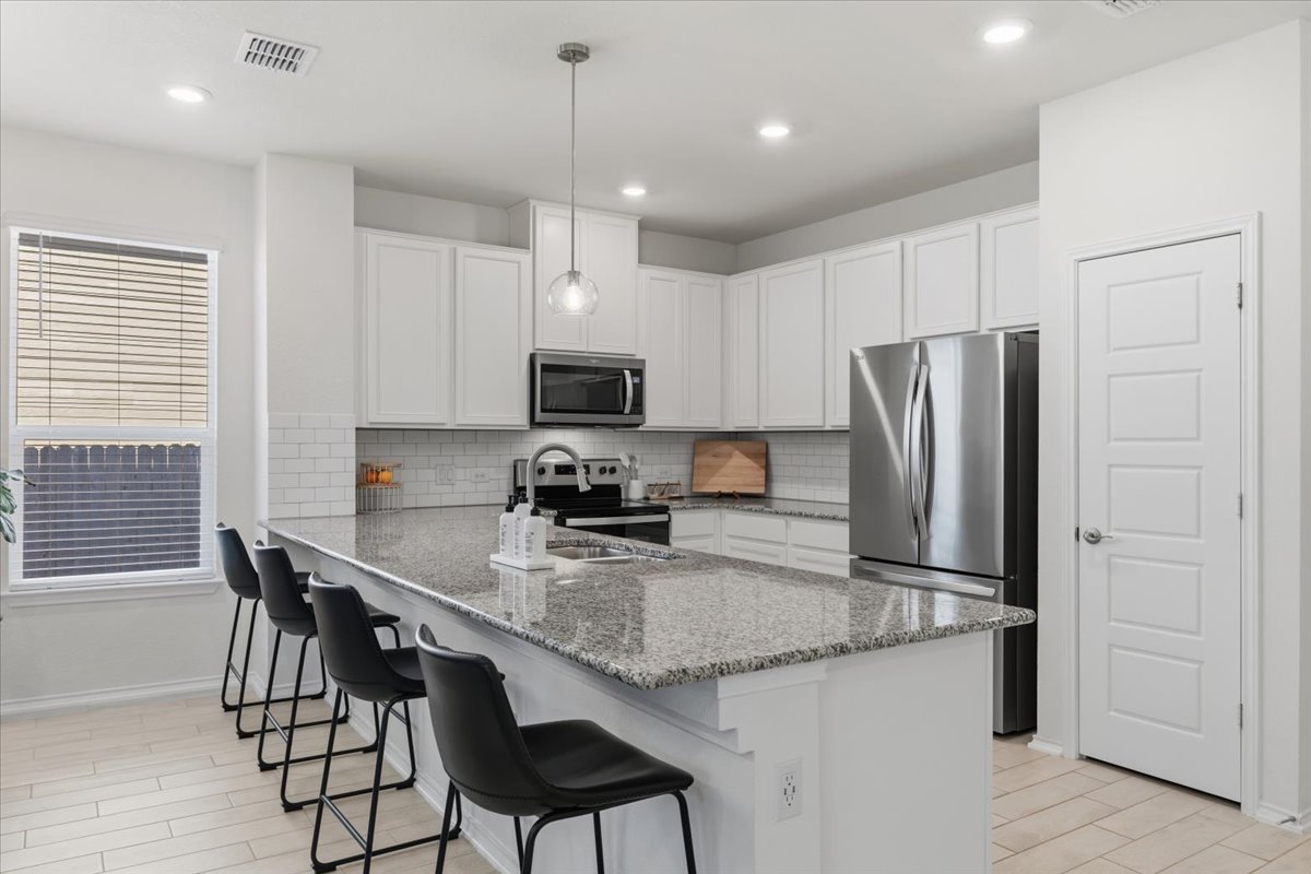6909 Daniel Ranch Drive Austin, TX 78744 - Photo 5 of 24 Refrigerator Included