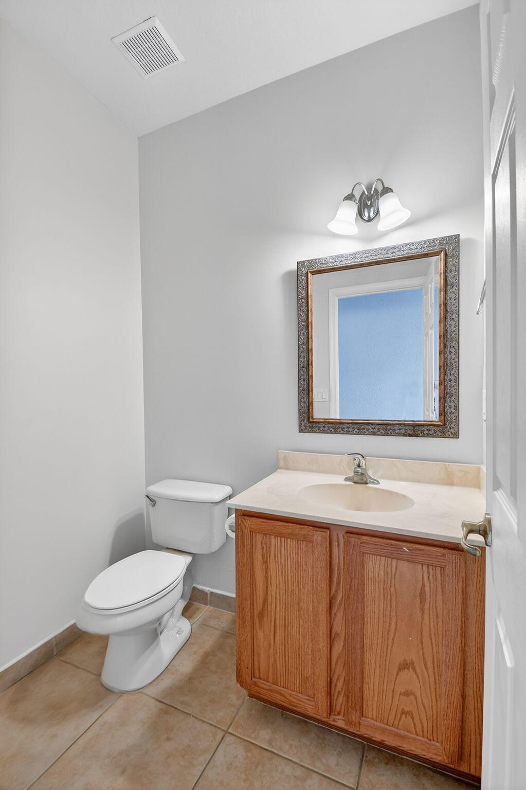 1053 Center Stone Lane Riviera Beach, FL 33404 - Photo 17 of 51 Half Bathroom