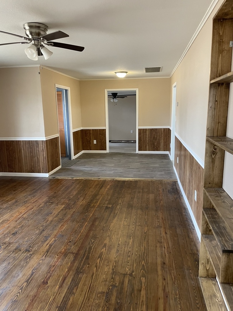 746 Mt Mission Road Metropolis, IL 62960 - Photo 2 of 24 a view of an empty room with wooden floor