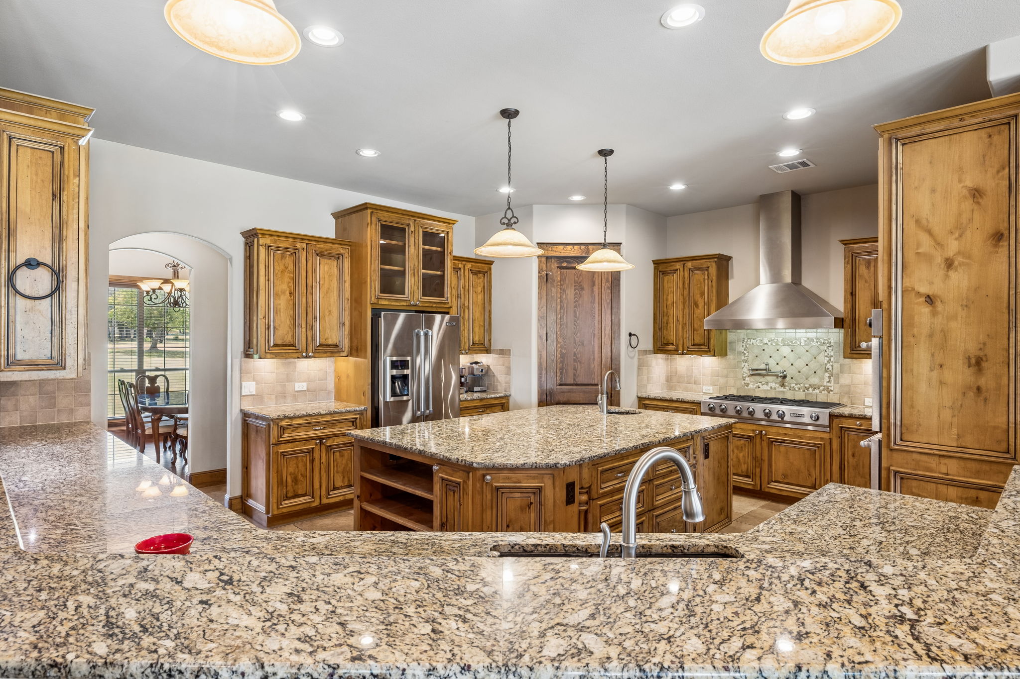 438 Patricia Road Georgetown, TX 78628 - Photo 10 of 36 A chef's dream w/ Knotty Alder Wood cabinets, granite counters & Stainless Steel appliances.