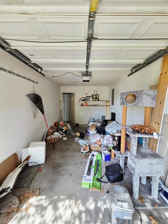 722 South Church Street Pilot Point, TX 76258 - Photo 34 of 37 a room with lots of furniture and clutter