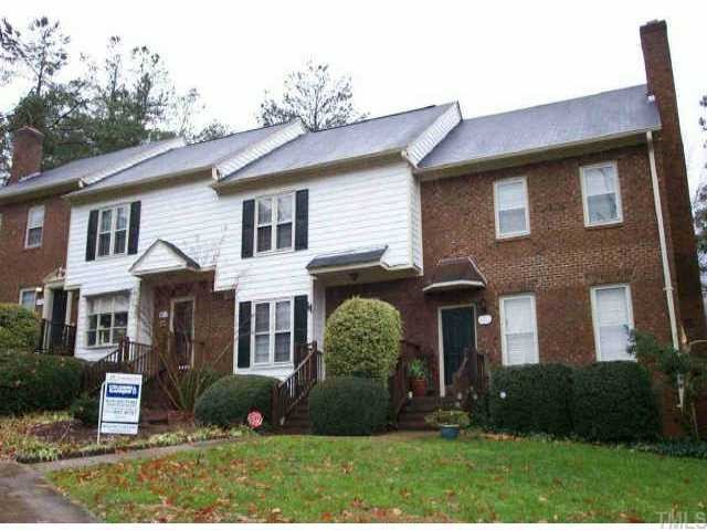 6219 Waterside Lane Raleigh, NC 27613 - Photo 1 of 1 a front view of a house with a yard