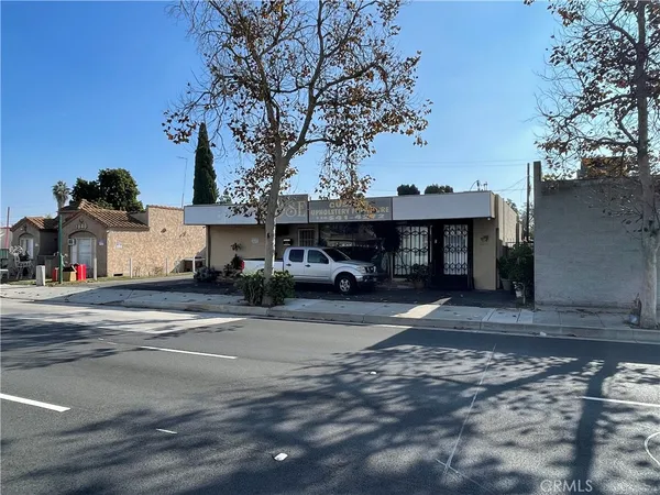 a view of a house with a street