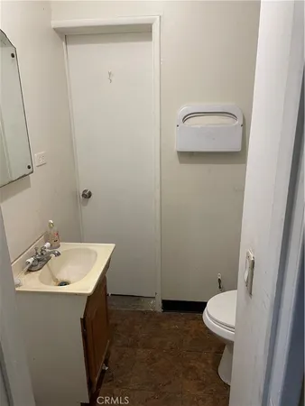 a room with furniture and a flat screen tv
