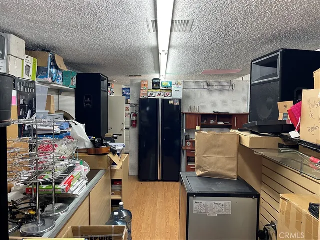 a utility room with sink dryer and washer