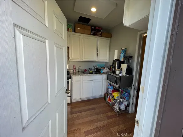 a room with furniture and a mirror