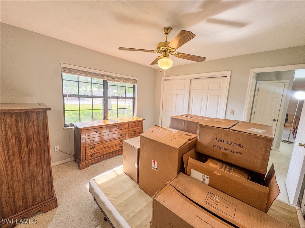 75 Hardee Street LaBelle, FL 33935 - Photo 18 of 24 a living room with furniture and a window