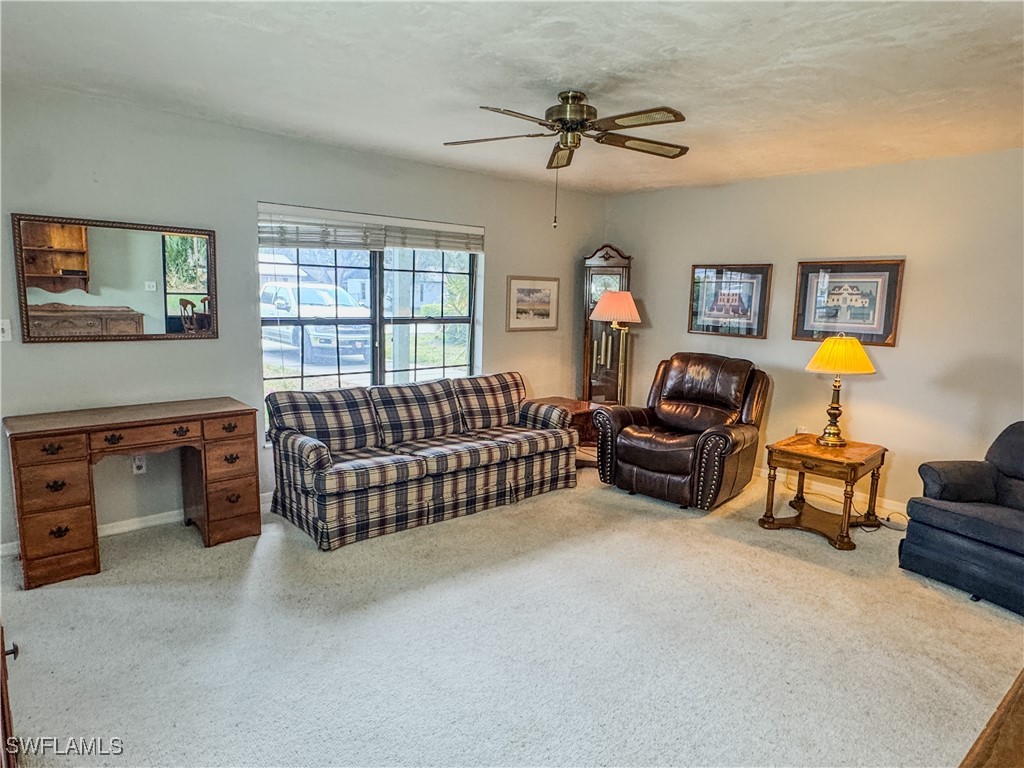 75 Hardee Street LaBelle, FL 33935 - Photo 6 of 24 a living room with furniture