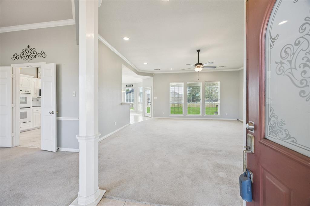 1107 Ruidoso Downs Drive Talty, TX 75160 - Photo 2 of 33 a view of an empty room with a window