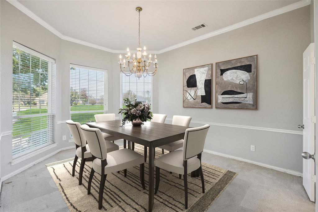 1107 Ruidoso Downs Drive Talty, TX 75160 - Photo 3 of 33 a view of a dining room with furniture window and outside view
