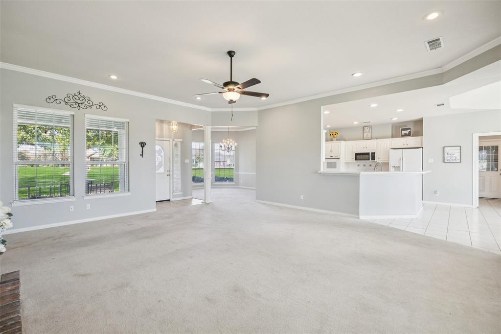 1107 Ruidoso Downs Drive Talty, TX 75160 - Photo 6 of 33 a view of an empty room with a window