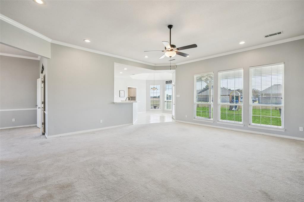 1107 Ruidoso Downs Drive Talty, TX 75160 - Photo 9 of 33 a view of an empty room with a window