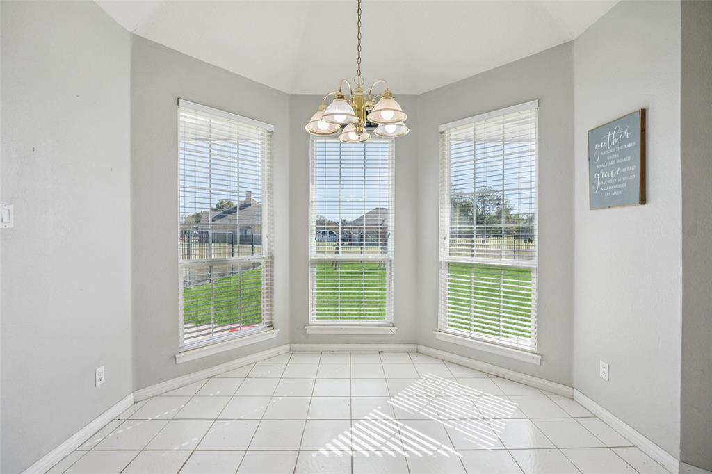 1107 Ruidoso Downs Drive Talty, TX 75160 - Photo 10 of 33 a view of an empty room with a window