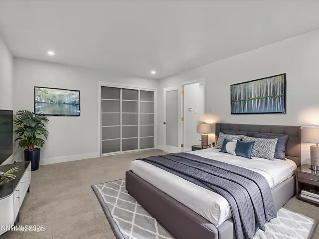 a view of balcony with couch and wooden floor