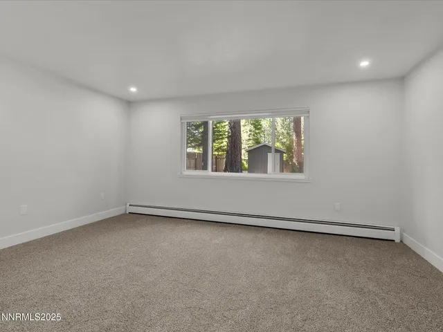 a view of house with a yard