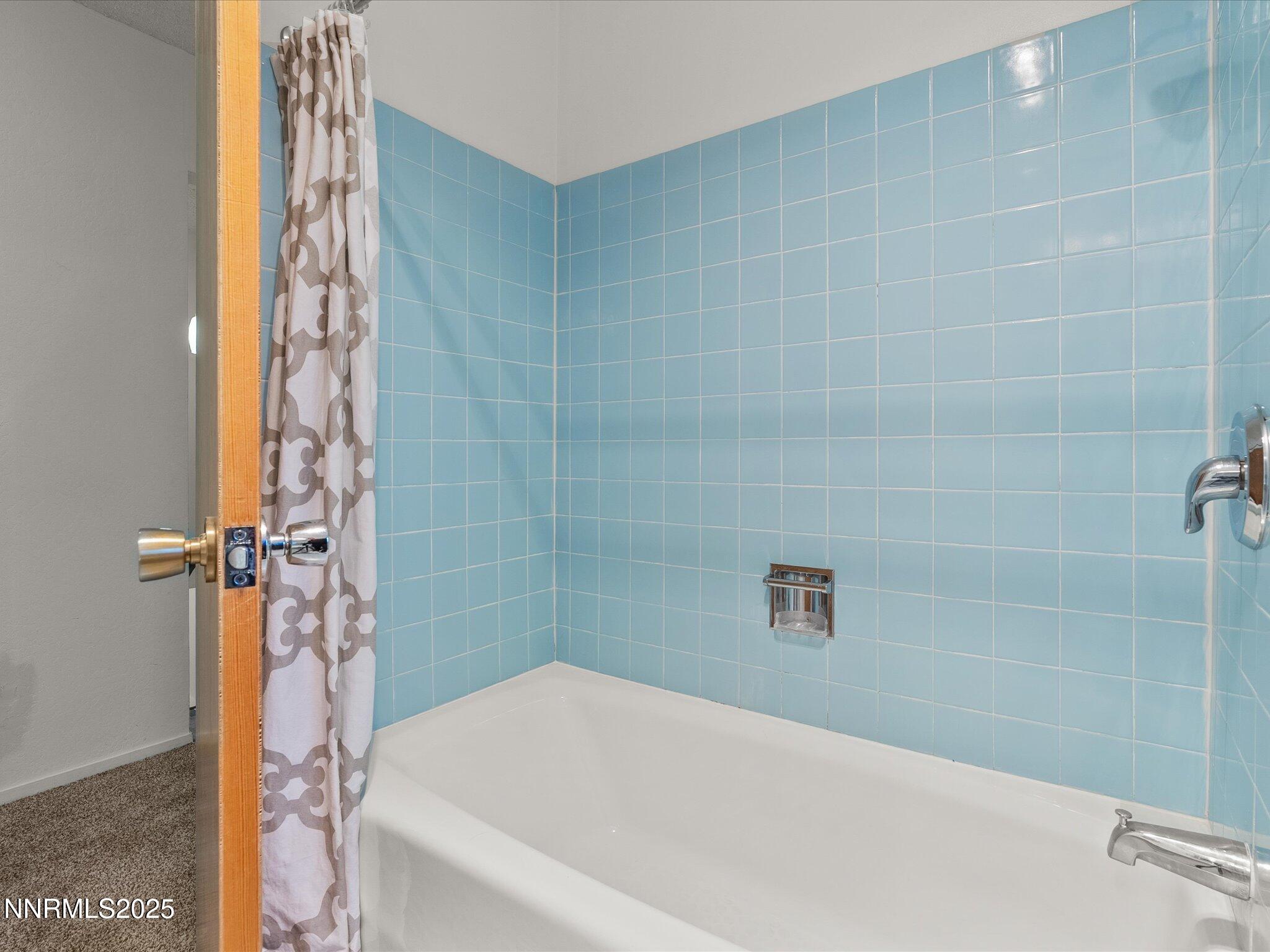 189 Ray Way Zephyr Cove, NV 89448 - Photo 38 of 71 a bathroom with a bathtub