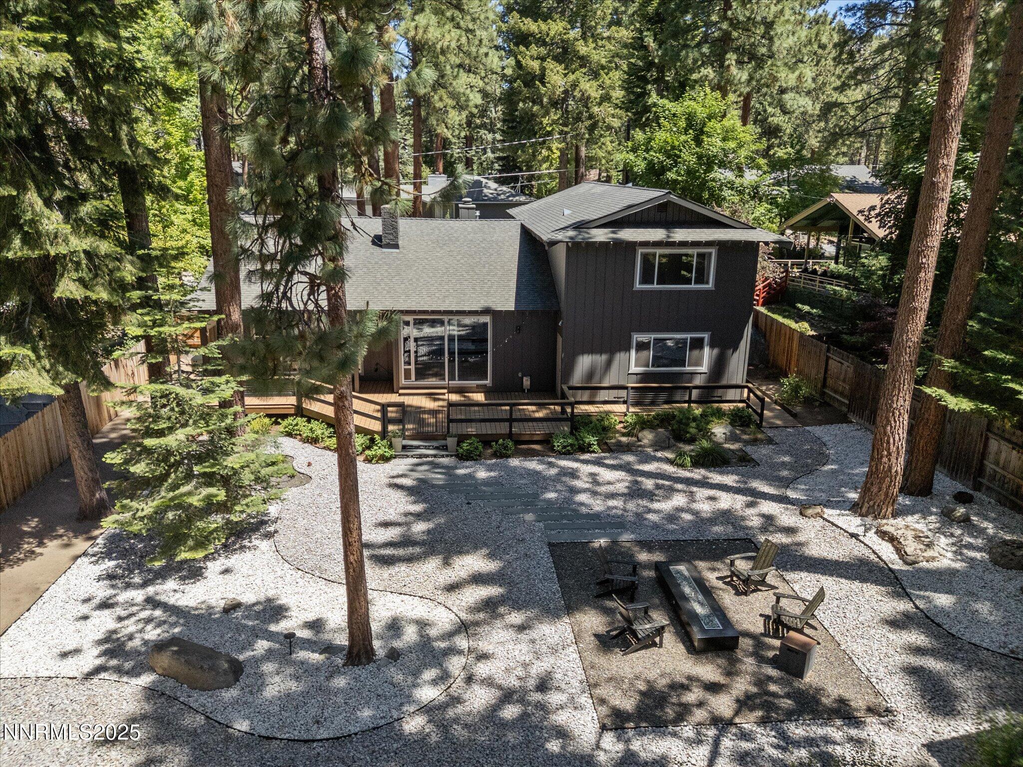 189 Ray Way Zephyr Cove, NV 89448 - Photo 61 of 71 a front view of a house with garden