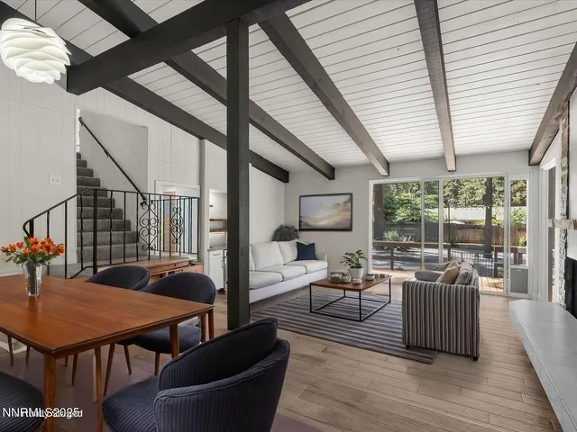 a kitchen with stainless steel appliances a stove sink and microwave