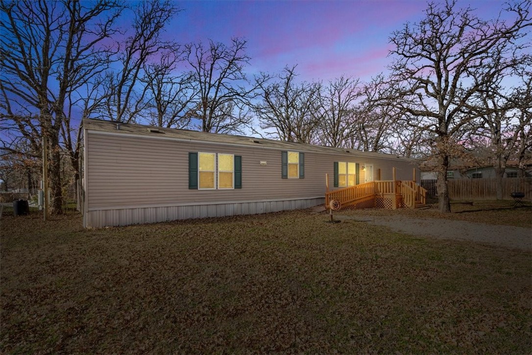 6067 Old Mexia Road Waco, TX 76705 - Photo 2 of 32 a backyard of a house with lots of green space
