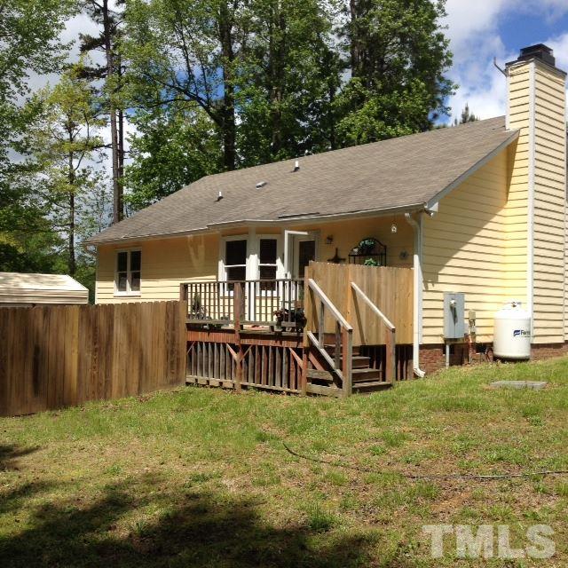 4300 Rockside Hills Drive Raleigh, NC 27603 - Photo 2 of 11 a view of a house with a yard