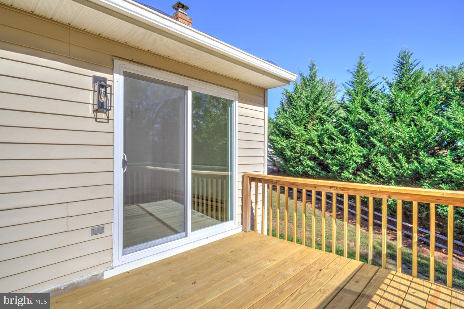 230 Hickory Drive Lititz, PA 17543 - Photo 10 of 43 a view of a wooden balcony and floor to ceiling window