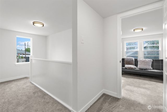 a living room with furniture and a gate