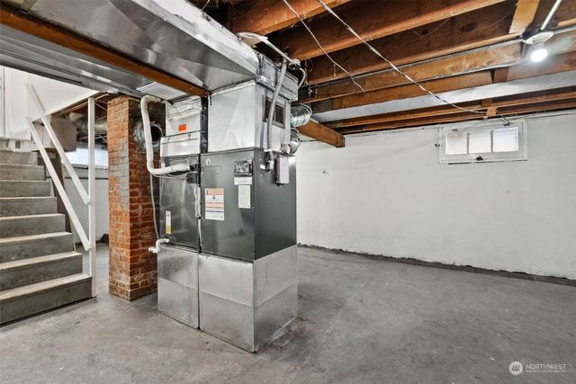 a view of an empty room with stairs
