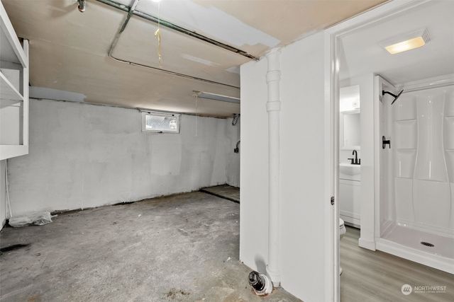 a view of a room with white walls