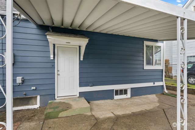 a house view with a backyard space