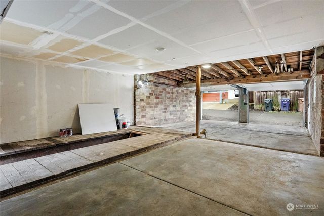 a backyard of a house with a garage