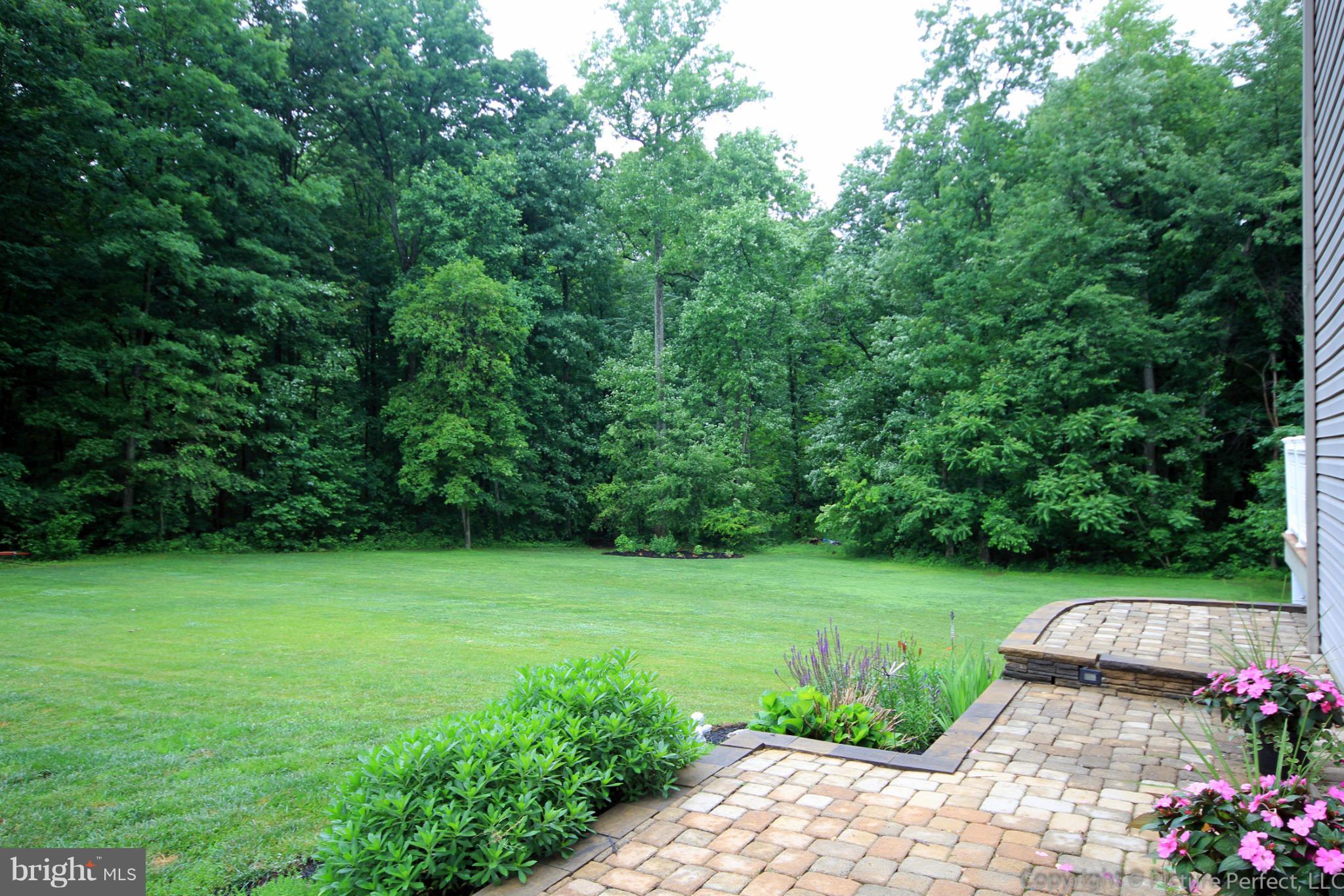 6668 Detrick Road Mount Airy, MD 21771 - Photo 28 of 30 Paver Patio leads to Backyard