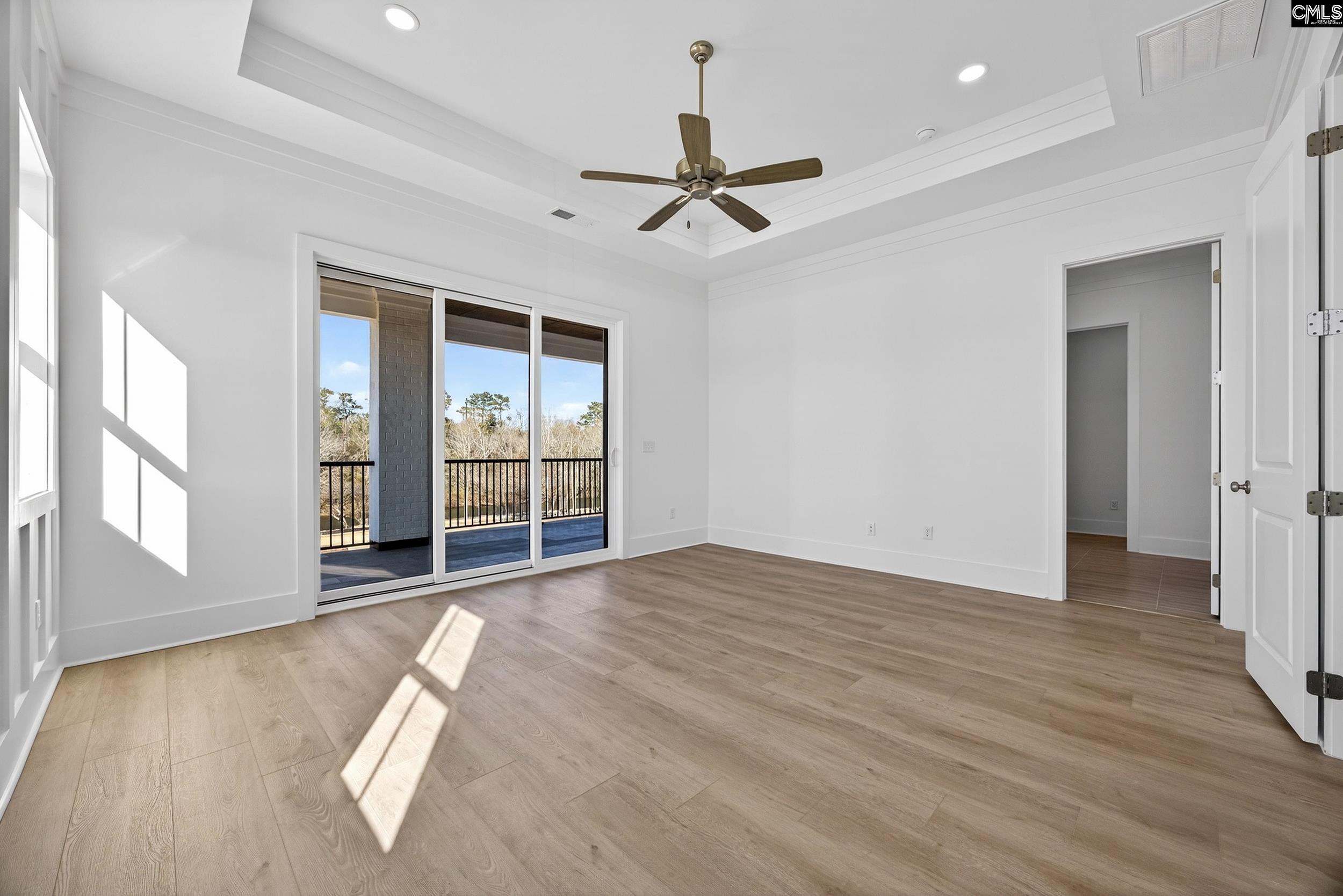 1318 Long Grove Way Lexington, SC 29072 - Photo 67 of 90 a view of a livingroom with a ceiling fan and window